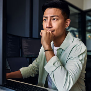 Man Looking At Desktop 