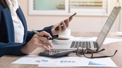 Office Worker Busy At Desk 