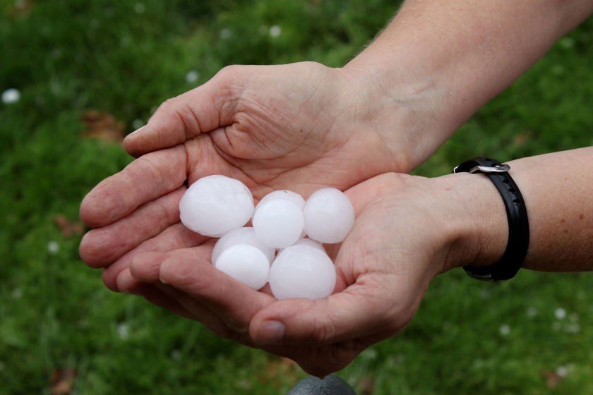 Close Up Of Hands Cupping Hail 