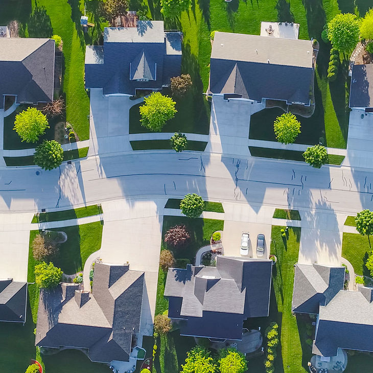 Aerial View Of Street In Residential Development 