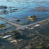 Aerial Nighborhood Devastated By Floodwaters 