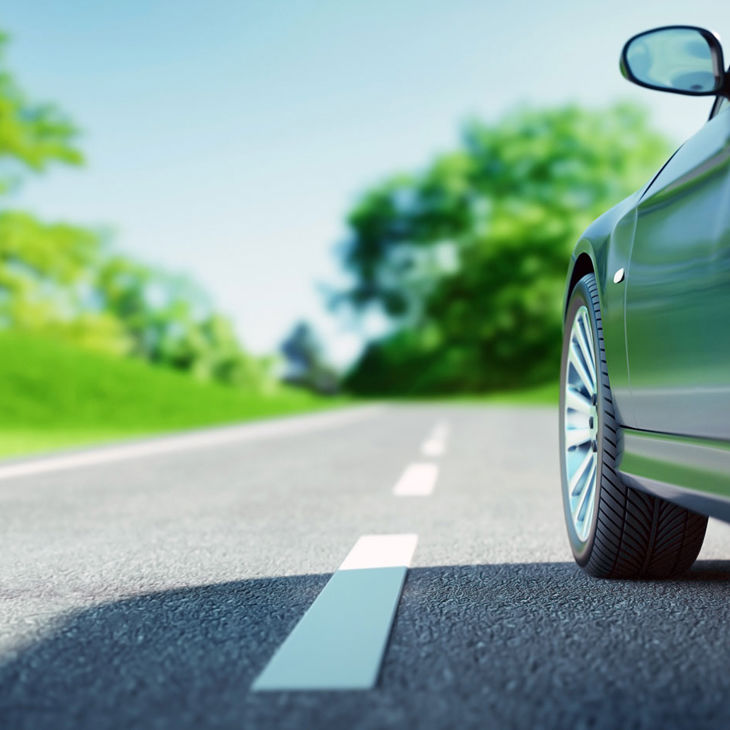 Car Driving Down Road 