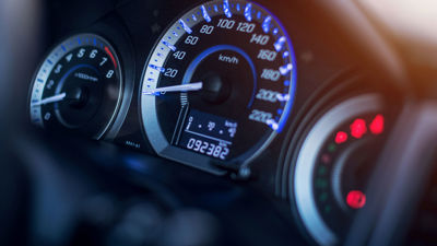 Close Up Of Speedometer On Dashboard 