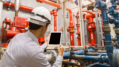 Inspecting Plumbing In Commercial Building 