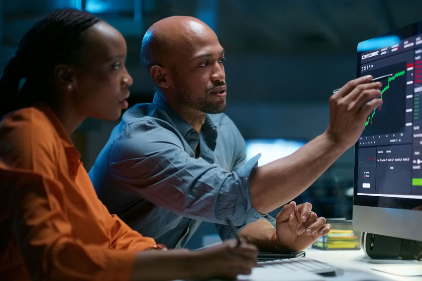 Coworkers Reviewing Data Dashboard 