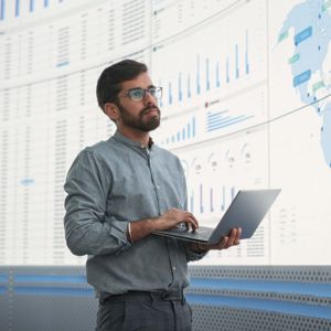 Standing Man Presenting Data 