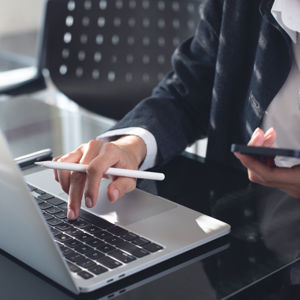 Businesswoman Working At Desk 