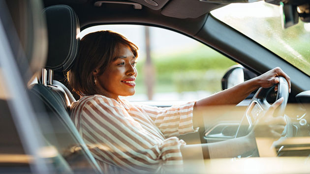 Smilingwomandrivingcar