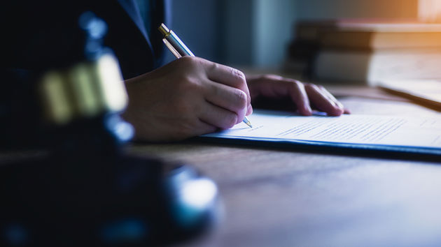 Signing A Law Contract 