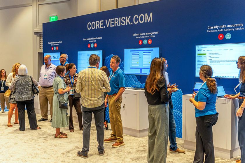 Group Of People At Conference Screens 