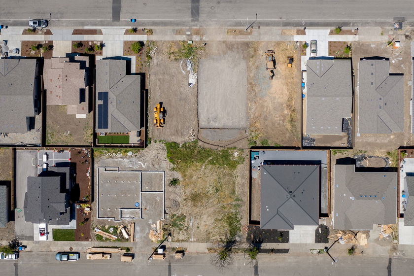 Aerial View Of Neighborhood Affected By Fire 