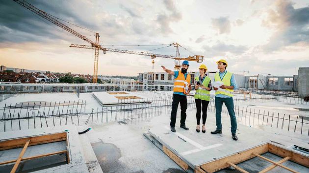 Contractors On Jobsite Roof 