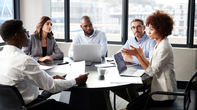 Colleagues In Animated Discussion 