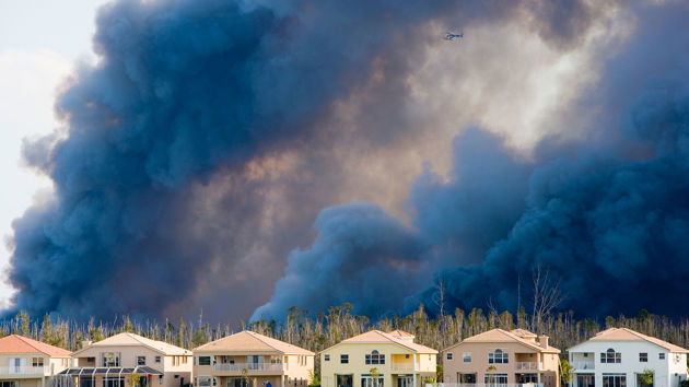 Wildfire Plumes Above Row Of Homes 