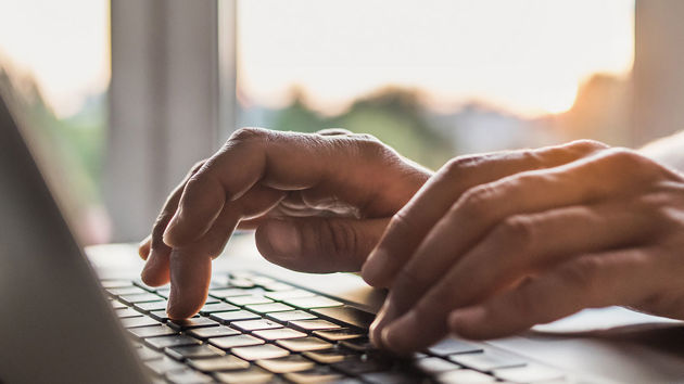 Hands Typing On Laptop 