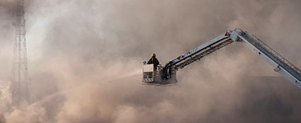 Firefighter on Ladder Truck fire-basket